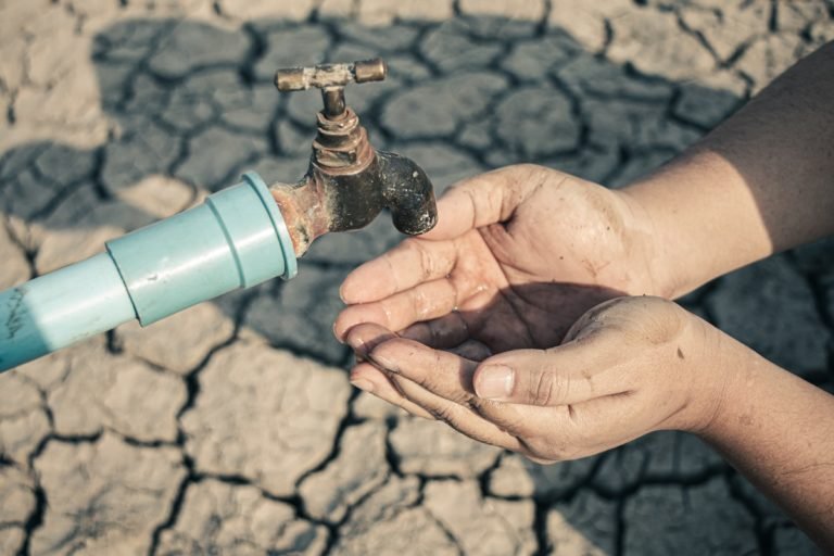 Hand,For,Drinking,Water,To,Live,Through,Drought,,Concept,Drought