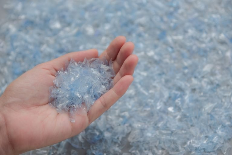 Woman,Hand,Holding,Bottle,Flake,pet,Bottle,Flake,plastic,Bottle,Crushed,small,Pieces