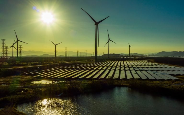 Wind,Turbine,Tower,Construction,With,Beautiful,Landscape,And,Blue,Sky